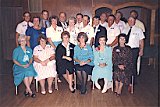 High school class of 1958 40th reunion in 1998. Front, l-r: Anna Marie Davidson (Marty), Pauline ? (Disch), Gloria ? (Lehnherr), Janet ? (Kehm), Nancy ? (Root), Kathleen ? (Grunder), Row 2: Virginia Daubert (Studer), Joyce ? (Zentner), Darlene ? (Lutze), George Hoffman, Norman Crouch, Ronald Hilliard, John Ponyiscanyi.  Rear, l-r: Armin Daubert, Roger Dooley, Ernest Gempeler, William Escher, Eugene Hefty, Gene Flesher, and Fritz Graber.